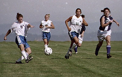 Photo of women's soccer team on the attack