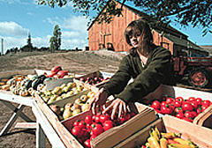 A woman preparing produce for sale