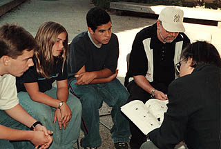 Photo of students and teacher with Spiegelman