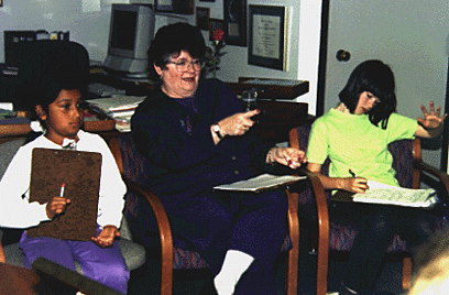Photo of two girls with Chancellor Greenwood