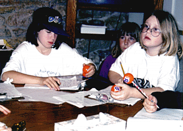 Photo of two girls asking questions