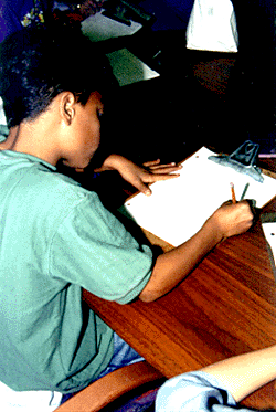 Photo of Aromas student writing