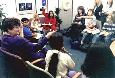 Photo of Chancellor Greenwood with Aromas students