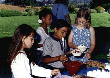 Photo of Aromas kids building ice cream sundaes