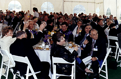 Photo of dinner group raising a toast