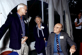 [Photo of Dean and Jane McHenry and Michael Nauenberg]