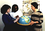 [Photo of Cathy Soussloff, Margo Hendricks, and Karen Bassi with globe]