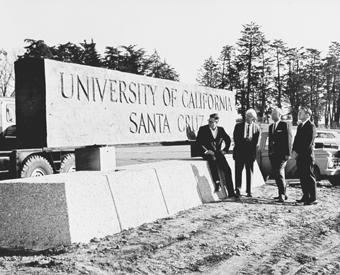Photo of Dean McHenry at sign dedication