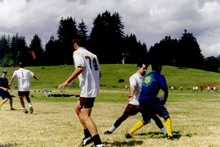 [Photo of UCSC ultimate team playing Stanford]