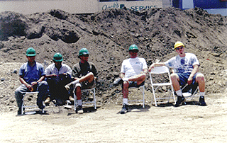 Photo of the project's construction workers, taking a lunch break during the ceremonies