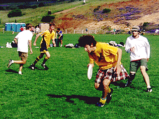 Photo of University of Washington ultimate player in kilt