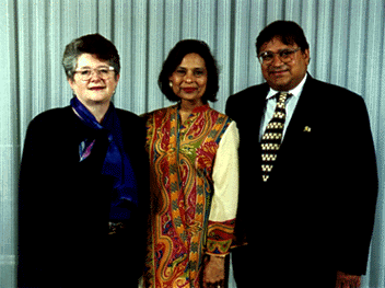 [Photo of Chandra and Narpat Bhandari with Chancellor Greenwood]
