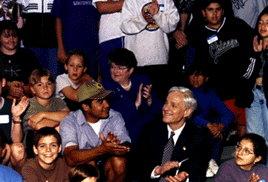 [Photo of Atkinson and chancellor with Branciforte kids]