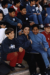 [Photo of two boys in group of Branciforte students]