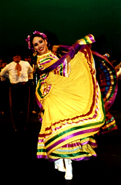 [Photo of Grupo Folklorico dancer]