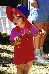 [Photo of toddler at Harvest Festival