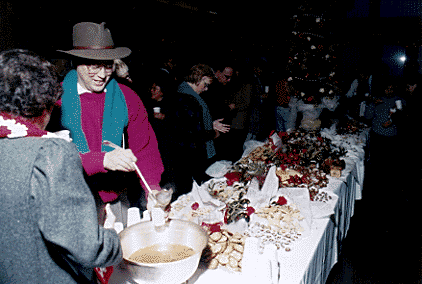 [Picture of table of drinks and food at party]