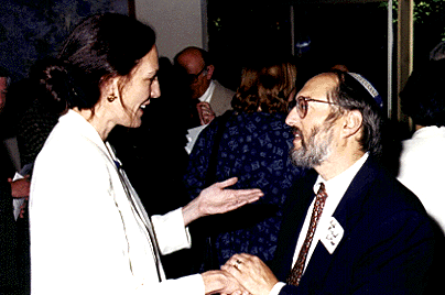 [Photo of Tandy Beal and Rabbi Richard Litvak]