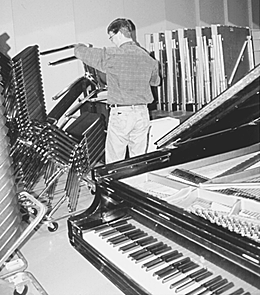 [Photo of Sven Davis working on Music Center move-in]
