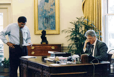 [Photo of Leon Panetta and President Clinton]