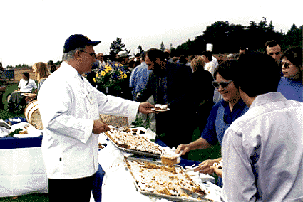 [Vice Chancellor
Tom Vani, serving food]