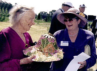 [Photo of Jane McHenry and Chancellor Greenwood]