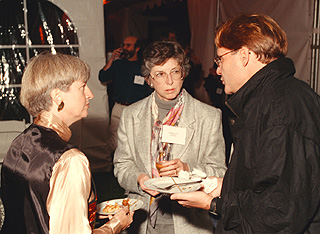 [Photo of three faculty members at the dinner]