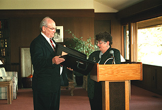 [Photo of Chancellor Greenwood and Roland Tharp]