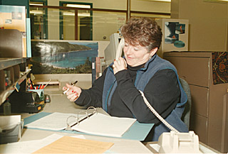 [Photo of Chancellor Greenwood making calls at Welcomes event]