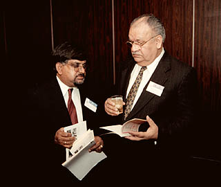 [Photo of Dilip Basu and Naresh Chandra]