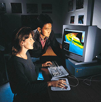 [ Photo of UCSC engineer and student ]